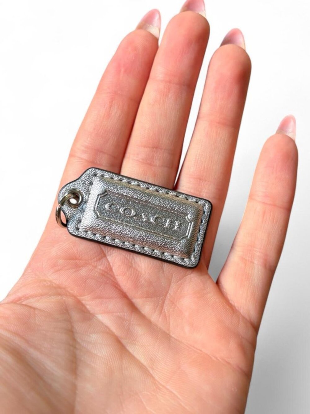 Coach silver leather hang tag    Approx 2.5 x 1 inch   By 90s vintage y2k